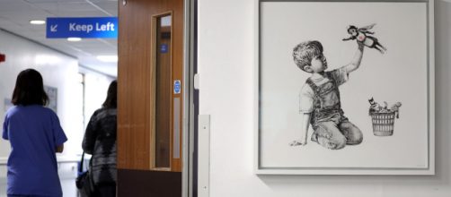 A new Banksy artwork of a superhero nurse appeared in a UK ... - com.au