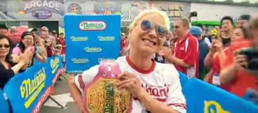 Miki Sudo sets women’s record, wins seventh Nathan’s Hotdog Eating Contest. [Image source/ESPN YouTube video]