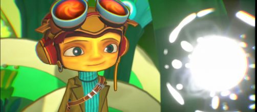 Raz is guided by a mete of light voiced by Jack Black. [Image Source: DoubleFineProd/YouTube]