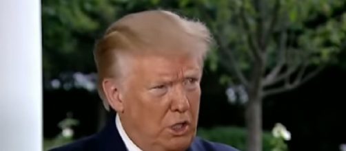 Donald Trump says he is 'all for face masks' and believes Russian bounties are 'a hoax.' [Image source/The Telegraph YouTube video]