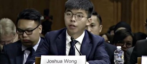 Joshua Wong is barred from running in the elections to LegCo, Hong Kong's Legislative Council. [Image source: Washington Post/YouTube Video]