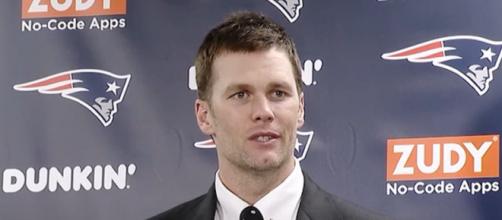 Evans says the 43-year-old Brady works extremely hard. [Image Source: New England Patriots/YouTube]