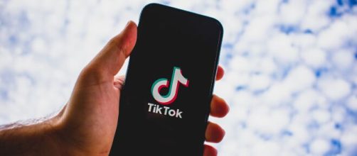 TikTok does not tolerate hate and they're making changes. [Image Source: Kon Karampelas/Unsplash]