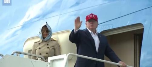President Trump waving as he enters the Air Force One. [Image Source: YouTube/Daily Mail, UK]