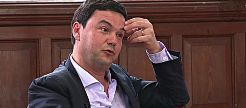 Thomas Piketty refused to have a censored version of his book published in China. [Image Source: Oxford Union/YouTube]