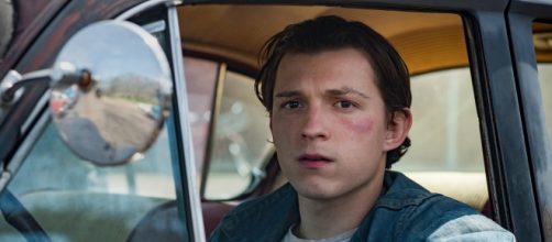 Tom Holland em cena de 'O Diabo de Cada Dia' da Netflix. (Arquivo Blasting News)