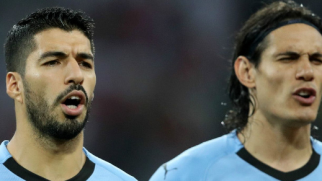 Luis Suarez con Edinson Cavani.
