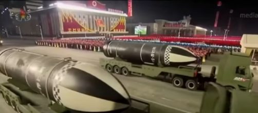North Korea unveils new submarine-launched ballistic missile at military parade. [©CNA YouTube video]