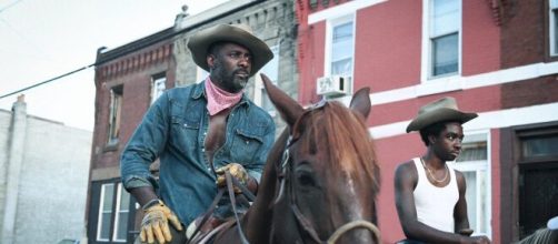 Idris Elba é um caubói que redescobre a paternidade no trailer de ... - com.br