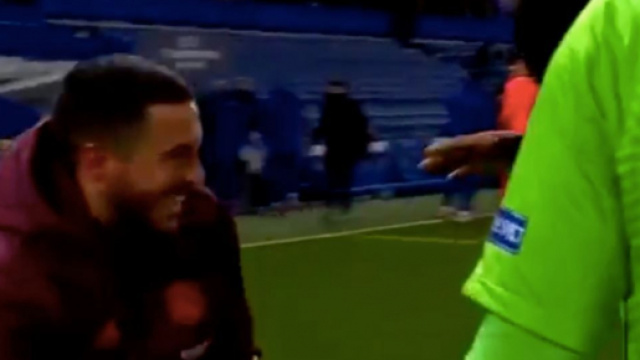 Hazard tout sourire après l'élimination du Real Madrid. (capture crédit match RMC Sport)