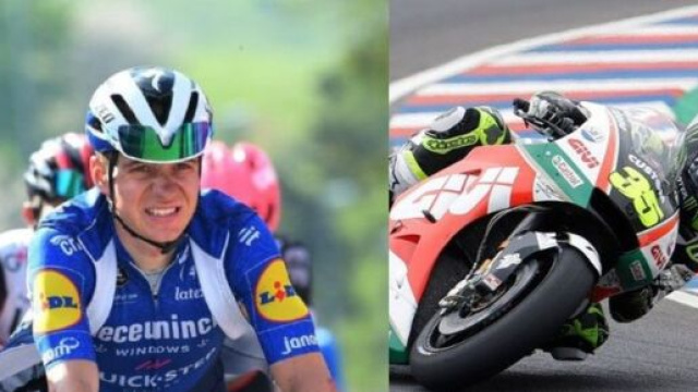 Remco Evenepoel e l'ex pilota di MotoGp Cal Crutchlow.