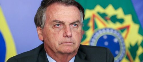 Bolsonaro pede para criança retirar máscara (Agência Brasil)