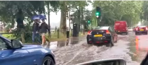 London weather: City awash with floods and heavy rain [Image source: The Independent/YouTube)