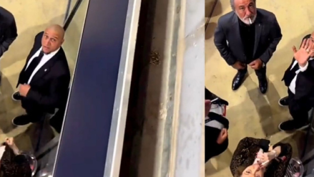 Roberto Carlos fume sa cigarette en compagnie de connaissance lors de Brésil Suisse Source : Capture Twitter