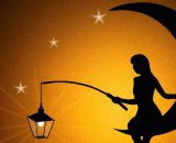 Figura femminile con lumino, luna e stelle - © Pixabay.