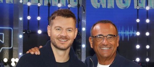 Alessandro Cattelan e Carlo Conti alla presentazione di Sanremo Giovani, immagine © Facebook Festival di Sanremo.