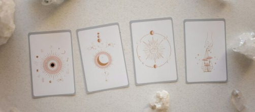 Disposizione di quattro carte dei tarocchi- © Pexels