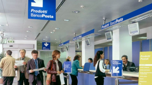 In foto degli impiegati di © Poste Italiane.