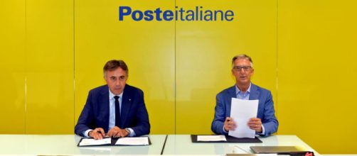 In foto dirigenti di Poste © Poste italiane