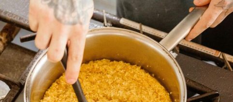 Risotto con pomodorini secchi, mortadella e stracciatella di bufala