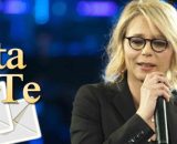 Il logo di C'è posta per te e Maria De Filippi © Mediaset