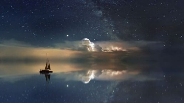 Barca sotto a un cielo stellato © pixabay