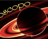 Saturno con scritta oroscopo su sfondo nero © Roberta Carsoli