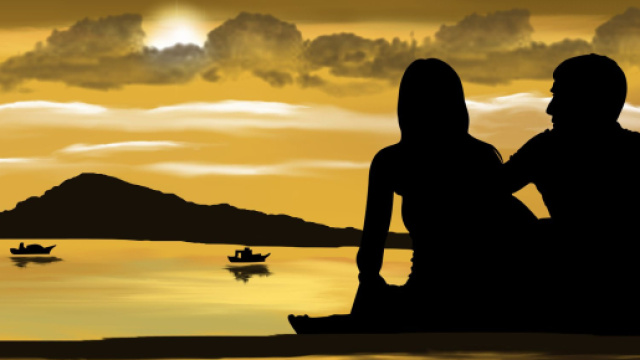 Coppia dialoga rimirando il paesaggio al tramonto - © Pixabay