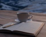 Agenda aperta con tazzina di caffè - © Pixabay