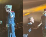 Billie Joe Armstrong dei Green Day sul palco con un fan (screenshot © TikTok),