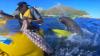 Kayaker gets a slap in the face from a seal, with an octopus