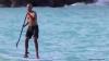 As Donald Trump orders strike on Iran, Barack Obama goes paddleboarding in Hawaii